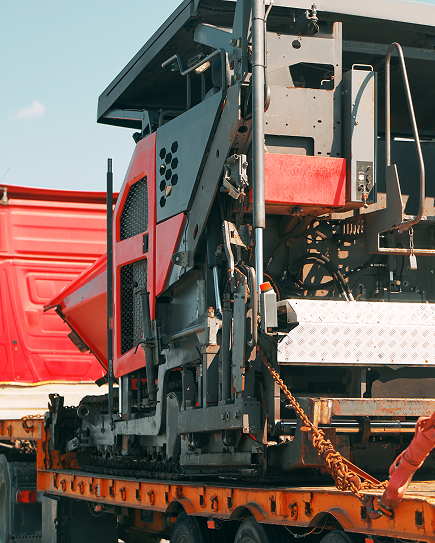 construction machinery loaded on trailer